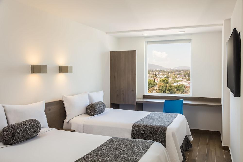 Sleep Inn Leon Antares Exteriör bild